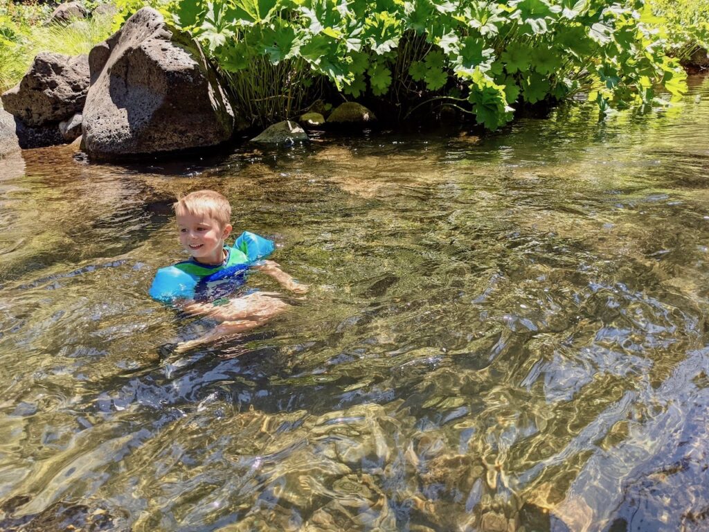 kids swimming in the McCloud River Northern California