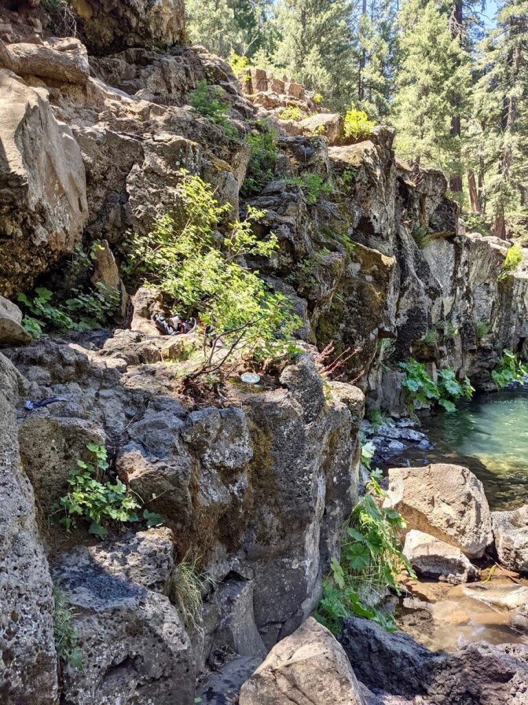 rocky bank down to the swimming hole at Lower Falls