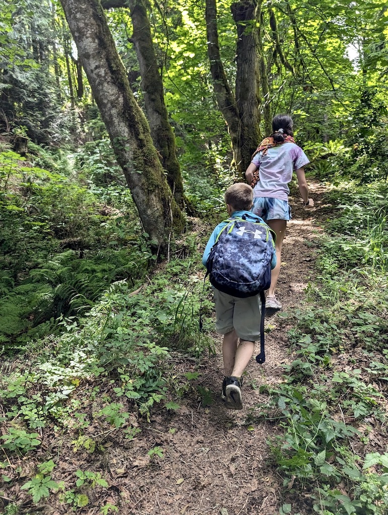 kids hiking trail on Harstine Island after leaving McMicken Island